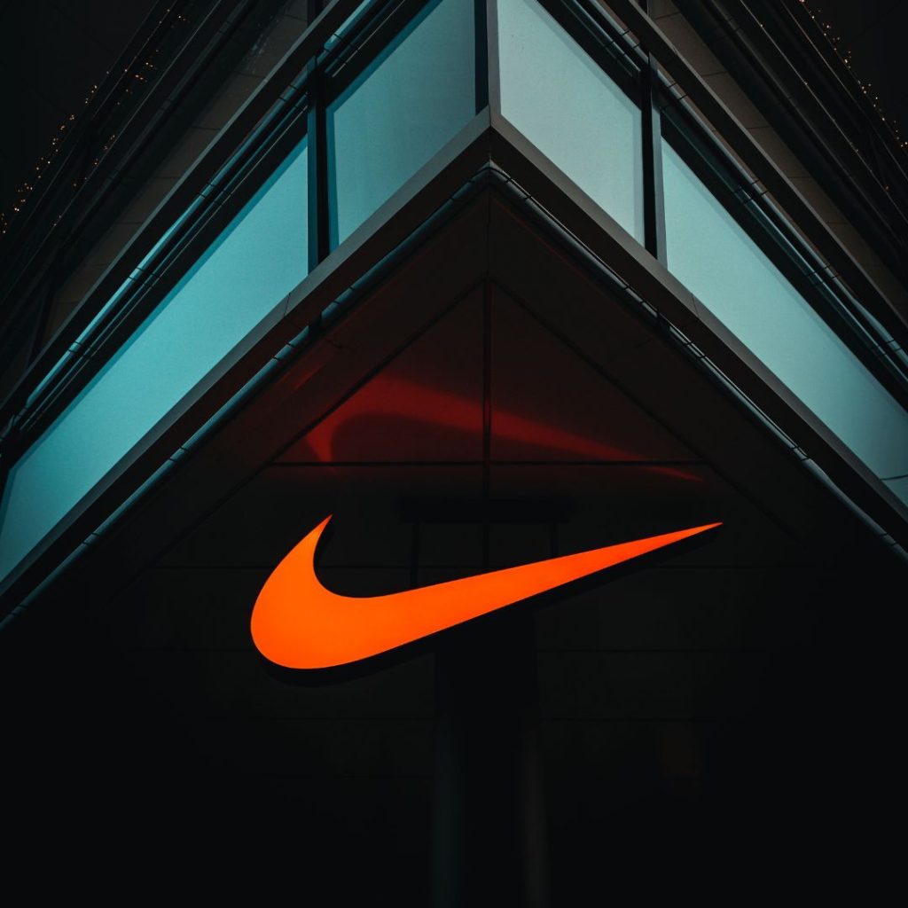 Nike logo prominently displayed on a building, exemplifying how brands can Stand Out with GTM strategies.